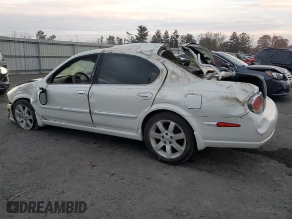 ✅ 2003 Nissan Maxima GLE • VIN: JN1DA31A63T412727 • Лот: 79184284. Опубликован ранее на Copart с пробегом Не указан. Бесплатный доступ к архиву аукционных продаж из США и подробный отчёт об истории автомобиля на DreamBid. Изображение 2.