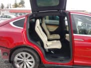 ✅ 2019 Tesla Model X 75D • VIN: 5YJXCBE21KF211465 • Lot: 43631824. Listed on IAAI with 112,351 mi. Free auction sales archive from the USA and detailed vehicle history report at DreamBid. Image 8.