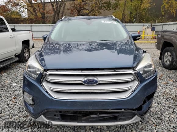 ✅ 2018 Ford Escape Titanium • VIN: 1FMCU9J92JUB01162 • Lot: 90094025. Wystawiony na Copart z przebiegiem Nie podano. Bezpłatny archiwum sprzedaży aukcyjnych z USA i szczegółowy raport historii pojazdu na DreamBid. Zdjęcie 5.
