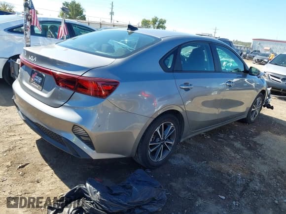 ✅ 2023 Kia Forte LXS • VIN: 3KPF24AD1PE654066 • Lot: 43507858. Listed on IAAI with 39,765 mi. Free auction sales archive from the USA and detailed vehicle history report at DreamBid. Image 4.
