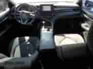 2021 Toyota Camry Hybrid LE with VIN 4T1C31AK5MU554381, listed as a Copart auction lot 69998775 with 104,313 mi miles and Salvage title. Bid and sale history available at DreamBid. Image 8.