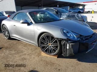 ✅ 2019 Porsche 911 Carrera • VIN: WP0CA2A92KS129254 • Lot: 41392032. Listed on IAAI with 26,153 mi. Free auction sales archive from the USA and detailed vehicle history report at DreamBid. Image 1.