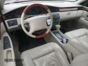 ✅ 2001 Cadillac Eldorado ESC • VIN: 1G6EL12Y61B107519 • Lot: 38051744. Listed on Copart with 52,018 mi. Free auction sales archive from the USA and detailed vehicle history report at DreamBid. Image 8.