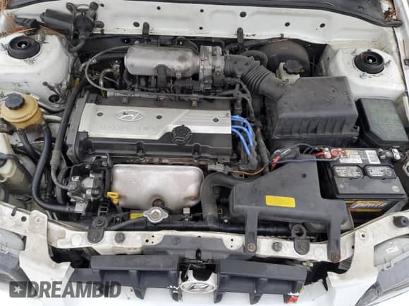 2002 Hyundai Accent GL z VIN KMHCG45C92U271388, wystawiony jako Copart lot #85925124 z przebiegiem 98 390 mil mil oraz Szkoda całkowita • Salvage title. Historia ofert i sprzedaży dostępna na DreamBid. Obrazek 11.