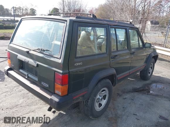 ✅ 1996 Jeep Cherokee Sport • VIN: 1J4FJ68S1TL204870 • Lot: 41726962. Listed on IAAI with 93,462 mi. Free auction sales archive from the USA and detailed vehicle history report at DreamBid. Image 4.