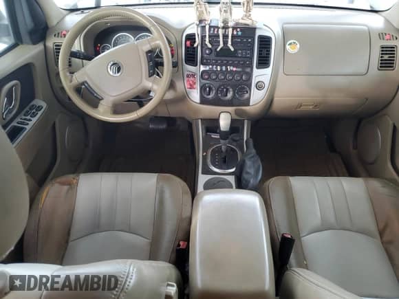 2006 Mercury Mariner Luxury with VIN 4M2CU56136DJ00202, listed as a Copart auction lot 85121264 with 103,242 mi miles and Salvage title. Bid and sale history available at DreamBid. Image 8.