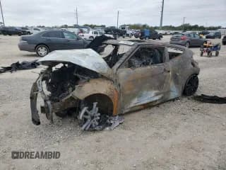 ✅ 2016 Hyundai Veloster • VIN: KMHTC6AD4GU265849 • Lot: 77399884. Wystawiony na Copart z przebiegiem Nie podano. Bezpłatny archiwum sprzedaży aukcyjnych z USA i szczegółowy raport historii pojazdu na DreamBid. Zdjęcie 1.