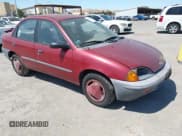 ✅ 1995 Geo Metro • VIN: 2C1MR5296S6764250 • Lot: 42585740. Listed on IAAI with 123,922 mi. Free auction sales archive from the USA and detailed vehicle history report at DreamBid. Image 1.