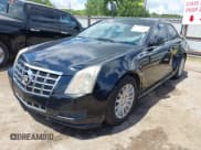 ✅ 2013 Cadillac CTS Luxury • VIN: 1G6DE5E59D0100837 • Лот: 42574781. Опубликован ранее на IAAI с пробегом 167 271 миль. Бесплатный доступ к архиву аукционных продаж из США и подробный отчёт об истории автомобиля на DreamBid. Изображение 2.