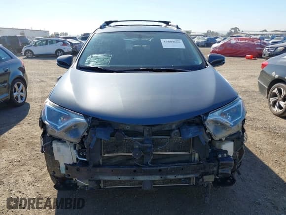 ✅ 2016 Toyota RAV4 XLE • VIN: JTMRJREVXGD012558 • Lot: 43809666. Listed on IAAI with 185,772 mi. Free auction sales archive from the USA and detailed vehicle history report at DreamBid. Image 6.