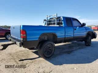 2000 Dodge 1500 с VIN 3B7HF13Z9YG148639, выставлен на аукционе Copart как лот 87698355 с пробегом 273 328 миль миль и Списание • Salvage title. История ставок и продаж доступна на DreamBid. Изображение 3.
