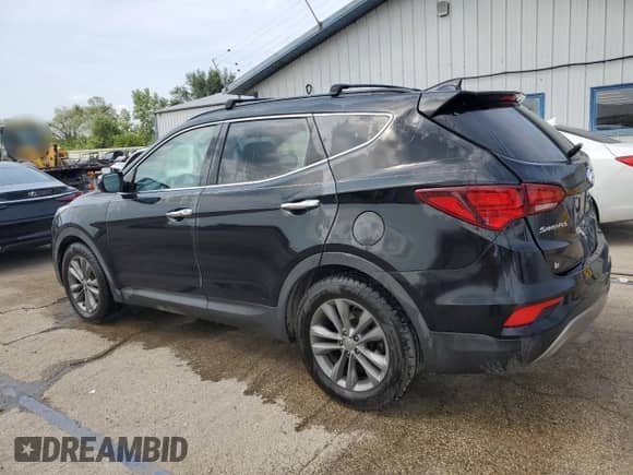 2017 Hyundai Santa Fe 2.0T with VIN 5XYZUDLA4HG483859, listed as a Copart auction lot 67836475 with 96,804 mi miles and Salvage title. Bid and sale history available at DreamBid. Image 2.
