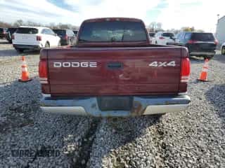 2002 Dodge Dakota SLT с VIN 1B7HG48N92S659160, выставлен на аукционе Copart как лот 79810184 с пробегом 145 405 миль миль и Списание • Salvage title. История ставок и продаж доступна на DreamBid. Изображение 6.