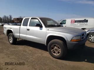 ✅ 2003 Dodge Dakota • VIN: 1D7HG12XX3S334064 • Lot: 48554465. Wystawiony na Copart z przebiegiem 140 660 mil. Bezpłatny archiwum sprzedaży aukcyjnych z USA i szczegółowy raport historii pojazdu na DreamBid. Zdjęcie 4.