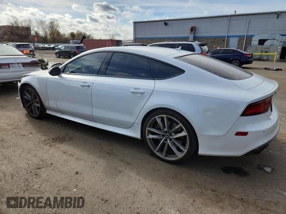 ✅ 2018 Audi RS 7 • VIN: WUAWRAFC1JN900307 • Лот: 91987375. Опубликован ранее на Copart с пробегом 23 848 миль. Бесплатный доступ к архиву аукционных продаж из США и подробный отчёт об истории автомобиля на DreamBid. Изображение 2.