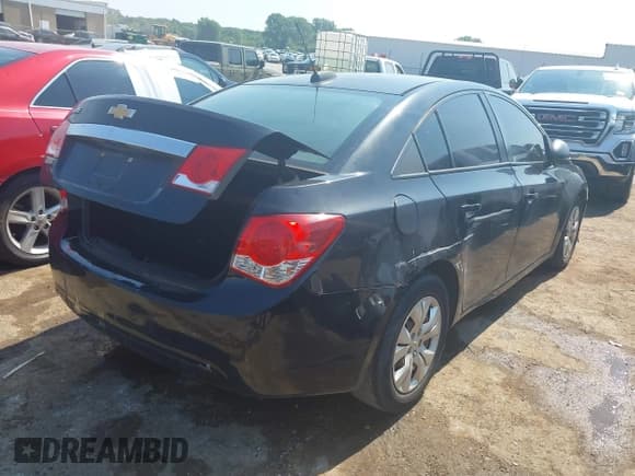✅ 2016 Chevrolet Cruze LS • VIN: 1G1PB5SH2G7187261 • Lot: 42927213. Listed on IAAI with 124,909 mi. Free auction sales archive from the USA and detailed vehicle history report at DreamBid. Image 4.