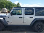 ✅ 2023 Jeep Wrangler Sport S • VIN: 1C4HJXDN2PW615882 • Lot: 42791138. Listed on IAAI with 21,993 mi. Free auction sales archive from the USA and detailed vehicle history report at DreamBid. Image 14.
