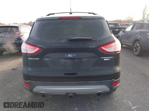 ✅ 2013 Ford Escape Titanium • VIN: 1FMCU9J9XDUD22920 • Lot: 43776015. Wystawiony na IAAI z przebiegiem 143 460 mil. Bezpłatny archiwum sprzedaży aukcyjnych z USA i szczegółowy raport historii pojazdu na DreamBid. Zdjęcie 16.