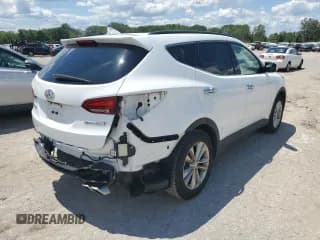 ✅ 2017 Hyundai Santa Fe 2.0T • VIN: 5XYZU3LA7HG390540 • Лот: 63862624. Опубликован ранее на Copart с пробегом 91 602 миль. Бесплатный доступ к архиву аукционных продаж из США и подробный отчёт об истории автомобиля на DreamBid. Изображение 3.