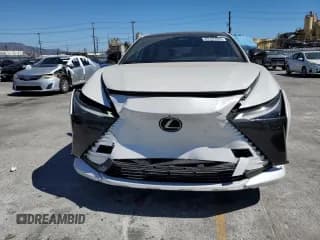 ✅ 2023 Lexus RZ 450e Premium • VIN: JTJAAAAB8PA006136 • Lot: 69795995. Listed on Copart with 31,942 mi. Free auction sales archive from the USA and detailed vehicle history report at DreamBid. Image 5.