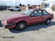 ✅ 1991 Pontiac Sunbird • VIN: 1G2JB11K7M7603646 • Lot: 79026564. Listed on Copart with 124,429 mi. Free auction sales archive from the USA and detailed vehicle history report at DreamBid. Image 1.