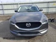 ✅ 2017 Mazda CX-5 Grand Touring • VIN: JM3KFBDL9H0220781 • Lot: 92483545. Wystawiony na Copart z przebiegiem 87 656 mil. Bezpłatny archiwum sprzedaży aukcyjnych z USA i szczegółowy raport historii pojazdu na DreamBid. Zdjęcie 5.