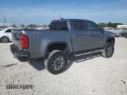 ✅ 2018 Chevrolet Colorado 4WD Z71 • VIN: 1GCGTDEN6J1288071 • Лот: 81923664. Опубликован ранее на Copart с пробегом 118 372 миль. Бесплатный доступ к архиву аукционных продаж из США и подробный отчёт об истории автомобиля на DreamBid. Изображение 3.