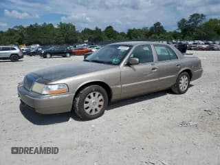 ✅ 2003 Mercury Grand Marquis LS Premium • VIN: 2MEHM75W33X695074 • Лот: 69408865. Опубликован ранее на Copart с пробегом 263 146 миль. Бесплатный доступ к архиву аукционных продаж из США и подробный отчёт об истории автомобиля на DreamBid. Изображение 1.