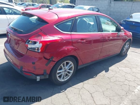 ✅ 2014 Ford Focus Titanium • VIN: 1FADP3N24EL158443 • Lot: 42801477. Listed on IAAI with 116,859 mi. Free auction sales archive from the USA and detailed vehicle history report at DreamBid. Image 4.