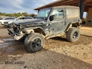 ✅ 2019 Jeep Wrangler Sport • VIN: 1C4GJXAG8KW677085 • Lot: 90125315. Listed on Copart with 94,275 mi. Free auction sales archive from the USA and detailed vehicle history report at DreamBid. Image 1.