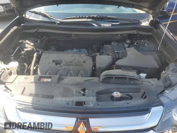 2018 Mitsubishi Outlander SE with VIN JA4AD3A34JJ001614, listed as a Copart auction lot 80107225 with 100,279 mi miles and Salvage title. Bid and sale history available at DreamBid. Image 12.