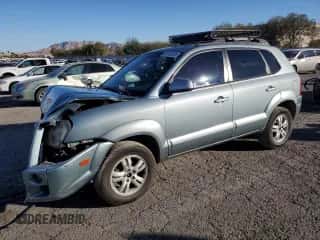 2006 Hyundai Tucson GLS z VIN KM8JN12D16U461376, wystawiony jako Copart lot #82132324 z przebiegiem 127 474 mil mil oraz Szkoda całkowita • Salvage title. Historia ofert i sprzedaży dostępna na DreamBid. Obrazek 1.