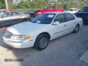 ✅ 1998 Lincoln Continental • VIN: 1LNLM97V1WY602564 • Лот: 42333637. Опубликован ранее на IAAI с пробегом 142 234 миль. Бесплатный доступ к архиву аукционных продаж из США и подробный отчёт об истории автомобиля на DreamBid. Изображение 2.