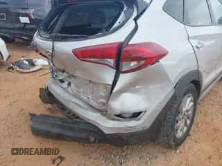 2017 Hyundai Tucson SE z VIN KM8J33A44HU400464, wystawiony jako IAAI lot #43404828 z przebiegiem 155 489 mil mil oraz . Historia ofert i sprzedaży dostępna na DreamBid. Obrazek 6.