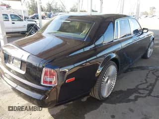 ✅ 2005 Rolls-Royce Phantom • VIN: SCA1S68465UX07717 • Lot: 42527996. Listed on IAAI with 43,248 mi. Free auction sales archive from the USA and detailed vehicle history report at DreamBid. Image 4.