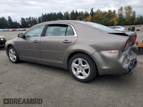 ✅ 2012 Chevrolet Malibu 1LS • VIN: 1G1ZB5E09CF150285 • Lot: 86843625. Listed on Copart with 129,115 mi. Free auction sales archive from the USA and detailed vehicle history report at DreamBid. Image 2.