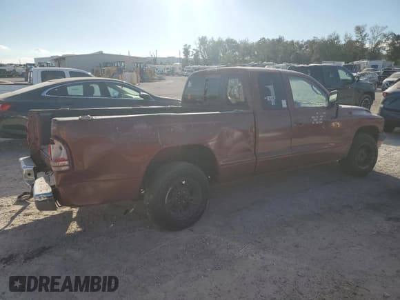 ✅ 2000 Dodge Dakota • VIN: 1B7GL22X9YS764702 • Lot: 83312094. Wystawiony na Copart z przebiegiem 235 503 mil. Bezpłatny archiwum sprzedaży aukcyjnych z USA i szczegółowy raport historii pojazdu na DreamBid. Zdjęcie 3.