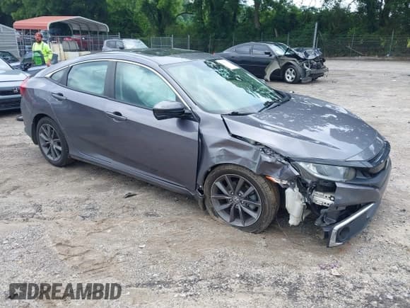 ✅ 2020 Honda Civic EX-L • VIN: 19XFC1F71LE010141 • Lot: 42502174. Listed on IAAI with 60,000 mi. Free auction sales archive from the USA and detailed vehicle history report at DreamBid. Image 1.