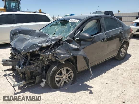 2014 Chevrolet Sonic LT с VIN 1G1JC5SH1E4122774, выставлен на аукционе Copart как лот 61878944 с пробегом Не указан миль и Списание • Salvage title. История ставок и продаж доступна на DreamBid. Изображение 1.