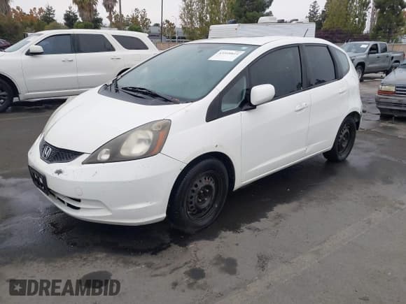 ✅ 2009 Honda Fit • VIN: JHMGE88219C006050 • Lot: 43599814. Listed on IAAI with 187,191 mi. Free auction sales archive from the USA and detailed vehicle history report at DreamBid. Image 2.