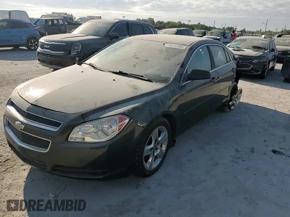 ✅ 2012 Chevrolet Malibu 1LS • VIN: 1G1ZB5E01CF168067 • Lot: 71671704. Listed on Copart with 169,599 mi. Free auction sales archive from the USA and detailed vehicle history report at DreamBid. Image 11.