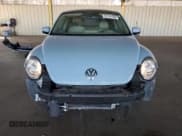 ✅ 2015 Volkswagen Beetle 2.0L TDI • VIN: 3VWJA7AT2FM621942 • Lot: 91216105. Listed on Copart with 73,480 mi. Free auction sales archive from the USA and detailed vehicle history report at DreamBid. Image 5.