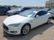 ✅ 2014 Tesla Model S P85D • VIN: 5YJSA1H21EFP68208 • Lot: 42490416. Listed on IAAI with 153,973 mi. Free auction sales archive from the USA and detailed vehicle history report at DreamBid. Image 6.