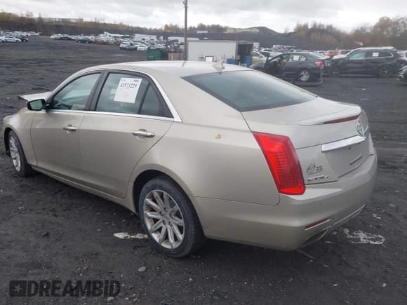 ✅ 2014 Cadillac CTS AWD • VIN: 1G6AW5SX4E0143103 • Лот: 43573229. Опубликован ранее на IAAI с пробегом 148 195 миль. Бесплатный доступ к архиву аукционных продаж из США и подробный отчёт об истории автомобиля на DreamBid. Изображение 3.