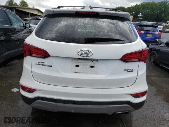 ✅ 2017 Hyundai Santa Fe 2.4L • VIN: 5NMZUDLB6HH003710 • Лот: 63537383. Опубликован ранее на Copart с пробегом 80 129 миль. Бесплатный доступ к архиву аукционных продаж из США и подробный отчёт об истории автомобиля на DreamBid. Изображение 6.