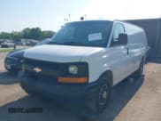 ✅ 2014 Chevrolet Express Cargo • VIN: 1GCWGFCG0E1100859 • Lot: 42142748. Listed on IAAI with 182,900 mi. Free auction sales archive from the USA and detailed vehicle history report at DreamBid. Image 2.