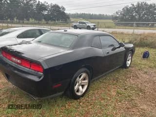 ✅ 2009 Dodge Challenger SE • VIN: 2B3LJ44V89H577103 • Lot: 82010204. Wystawiony na Copart z przebiegiem 172 791 mil. Bezpłatny archiwum sprzedaży aukcyjnych z USA i szczegółowy raport historii pojazdu na DreamBid. Zdjęcie 4.
