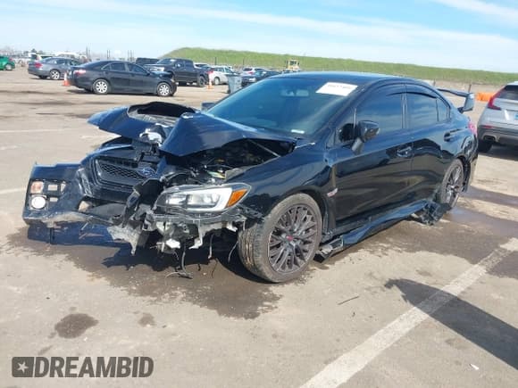 ✅ 2015 Subaru WRX STI • VIN: JF1VA2L68F9824207 • Lot: 41637409. Listed on IAAI with 95,332 mi. Free auction sales archive from the USA and detailed vehicle history report at DreamBid. Image 2.