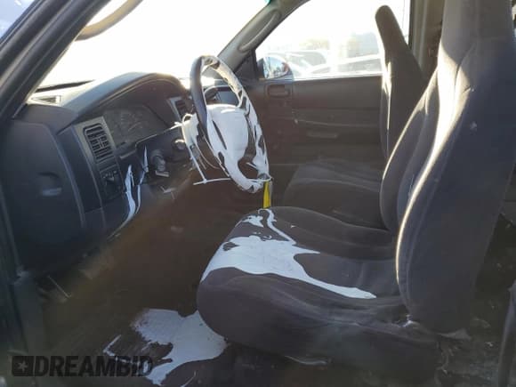 ✅ 2002 Dodge Dakota • VIN: 1B7GL12X32S557546 • Lot: 66879734. Wystawiony na Copart z przebiegiem 218 981 mil. Bezpłatny archiwum sprzedaży aukcyjnych z USA i szczegółowy raport historii pojazdu na DreamBid. Zdjęcie 7.