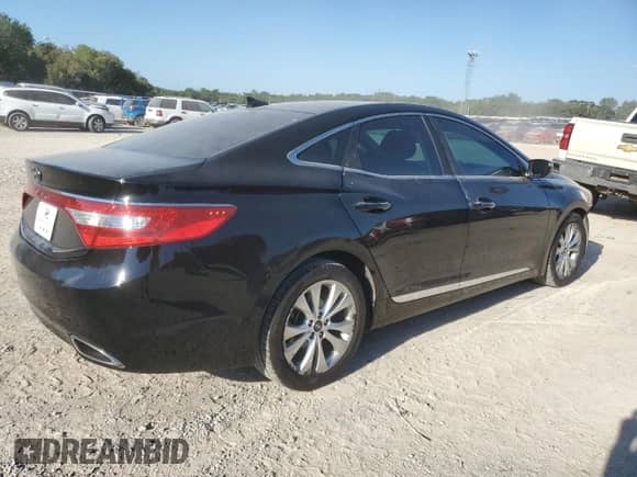 2013 Hyundai Azera z VIN KMHFG4JG7DA217419, wystawiony jako Copart lot #69759134 z przebiegiem 90 918 mil mil oraz Szkoda całkowita • Salvage title. Historia ofert i sprzedaży dostępna na DreamBid. Obrazek 3.